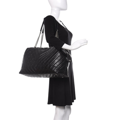 Chanel Aged Calfskin Chevron Quilted Duffle Bag Black 2 of 12