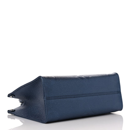 Louis Vuitton Metallic Empreinte Monogram Giant Onthego PM Navy Nacre 4 of 8