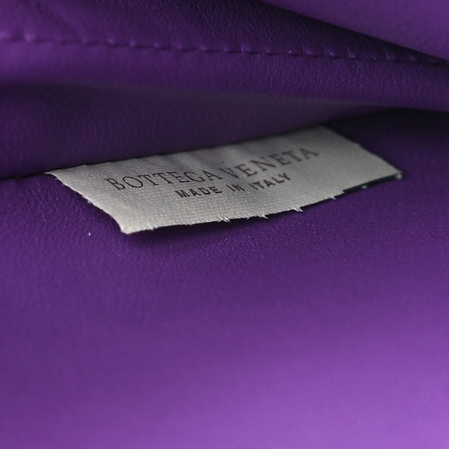 Stingray Piano Crisscross Clutch Purple