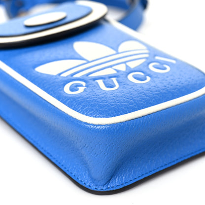 Gucci X ADIDAS Textured Dollar Calfskin Trefoil Embossed Phone Crossbody Bag Oriental Blue Mystic White 9 of 10