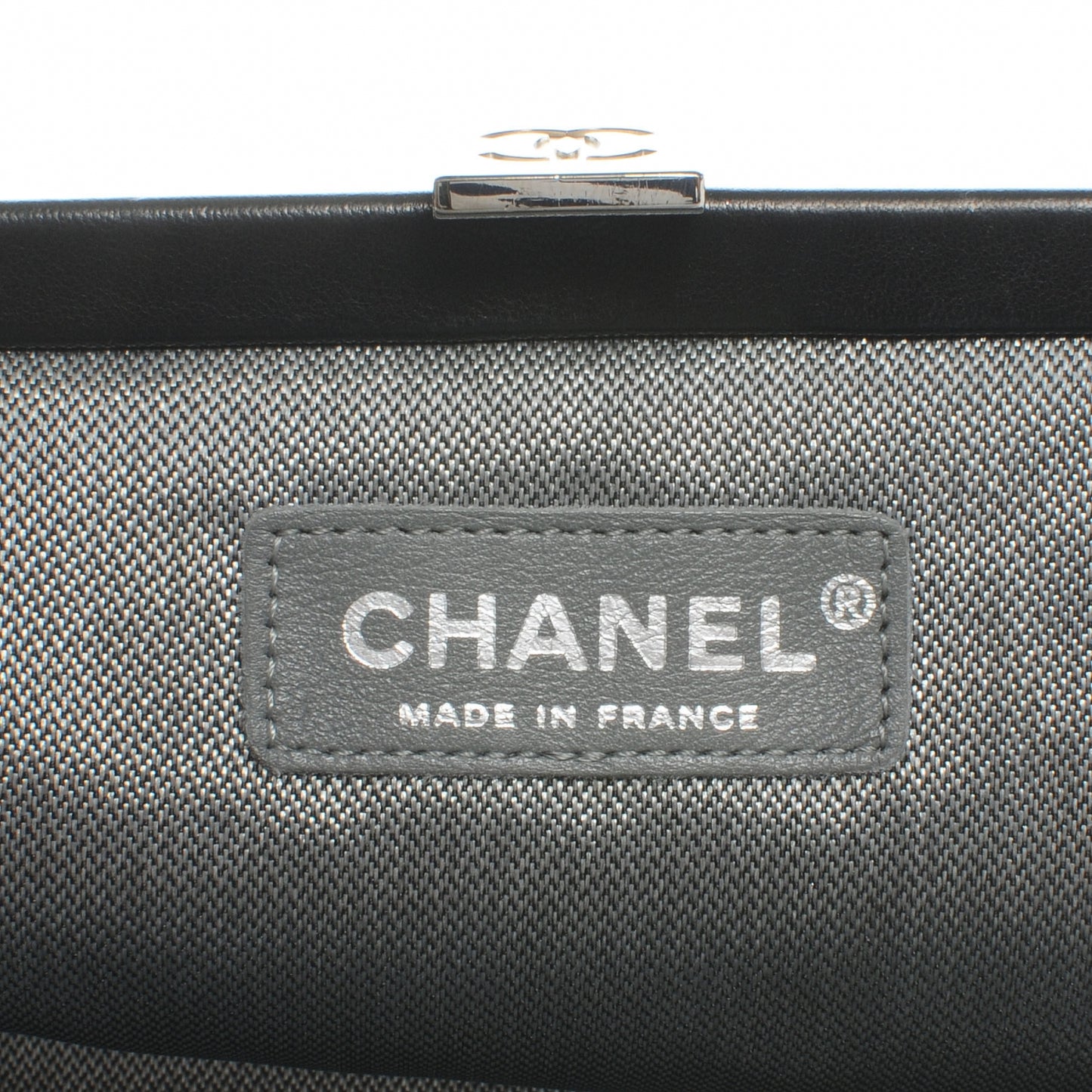 Lambskin Vertical Quilted Mademoiselle Clutch Black