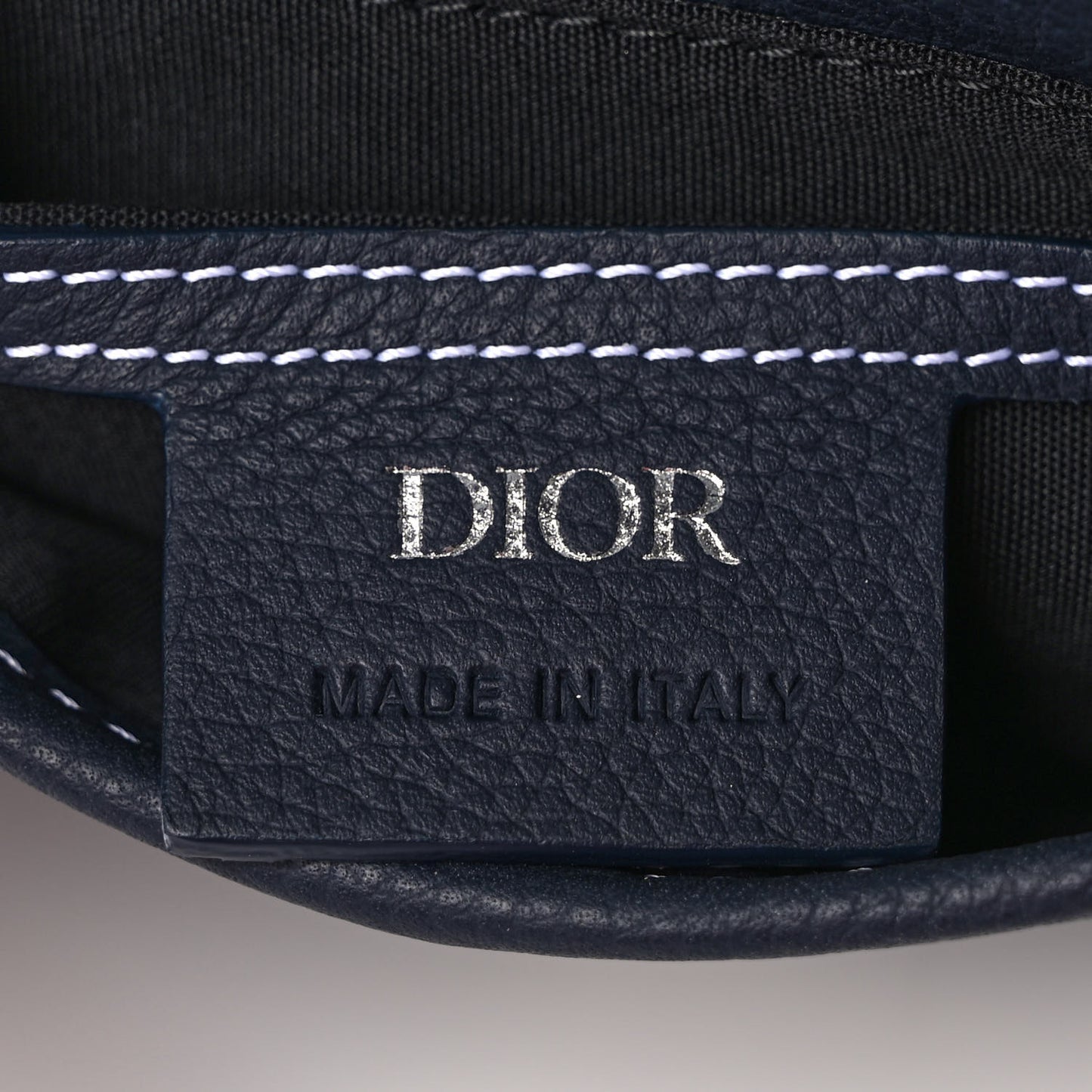 X KAWS Grained Calfskin Saddle Pouch Blue Multicolor