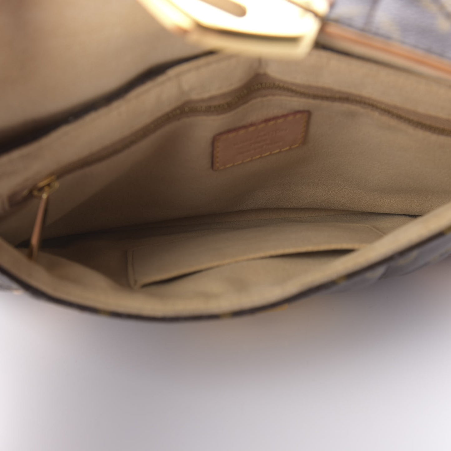 Monogram Etoile Clutch