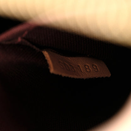 Louis Vuitton Monogram Rivoli MM 7 of 14
