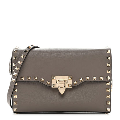 Valentino Garavani Pebbled Calfskin Medium Rockstud Flip Lock Crossbody Bag Poudre 1 of 10