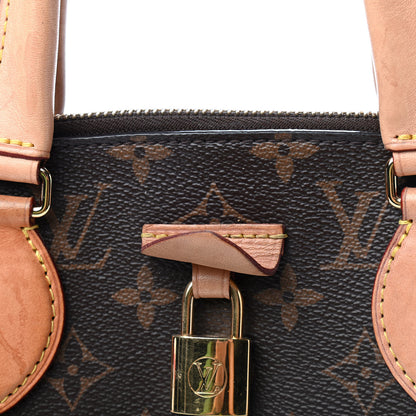 Louis Vuitton Monogram Rivoli PM 7 of 10