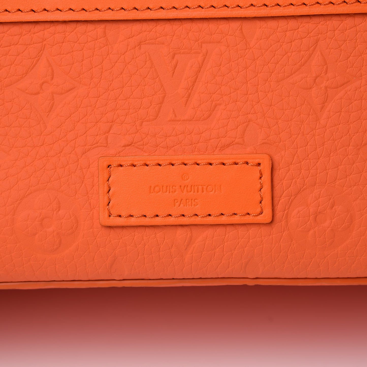 Taurillon Empreinte Soft Trunk Backpack PM Orange