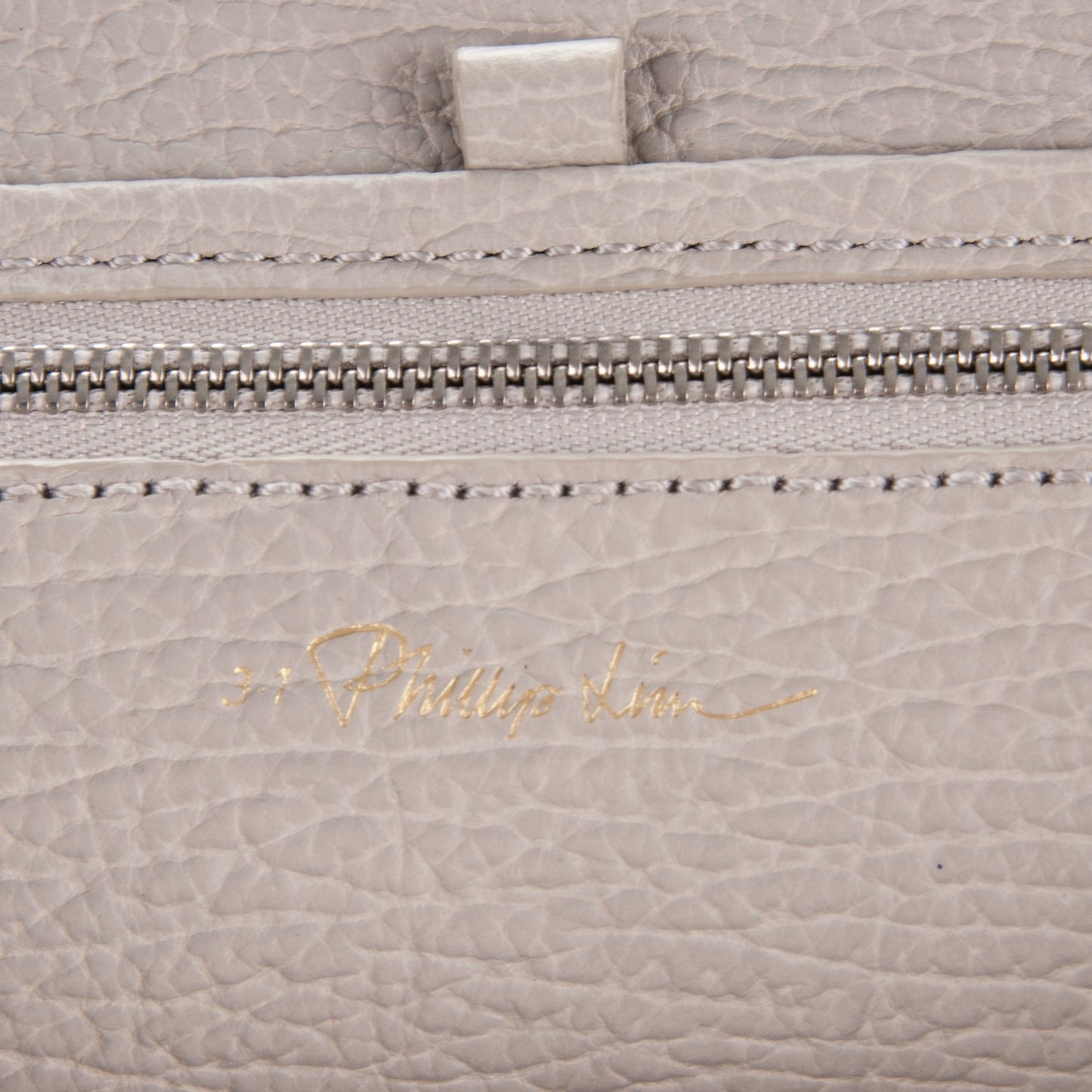 3.1 Textured Calfskin Pashli Backpack Feather