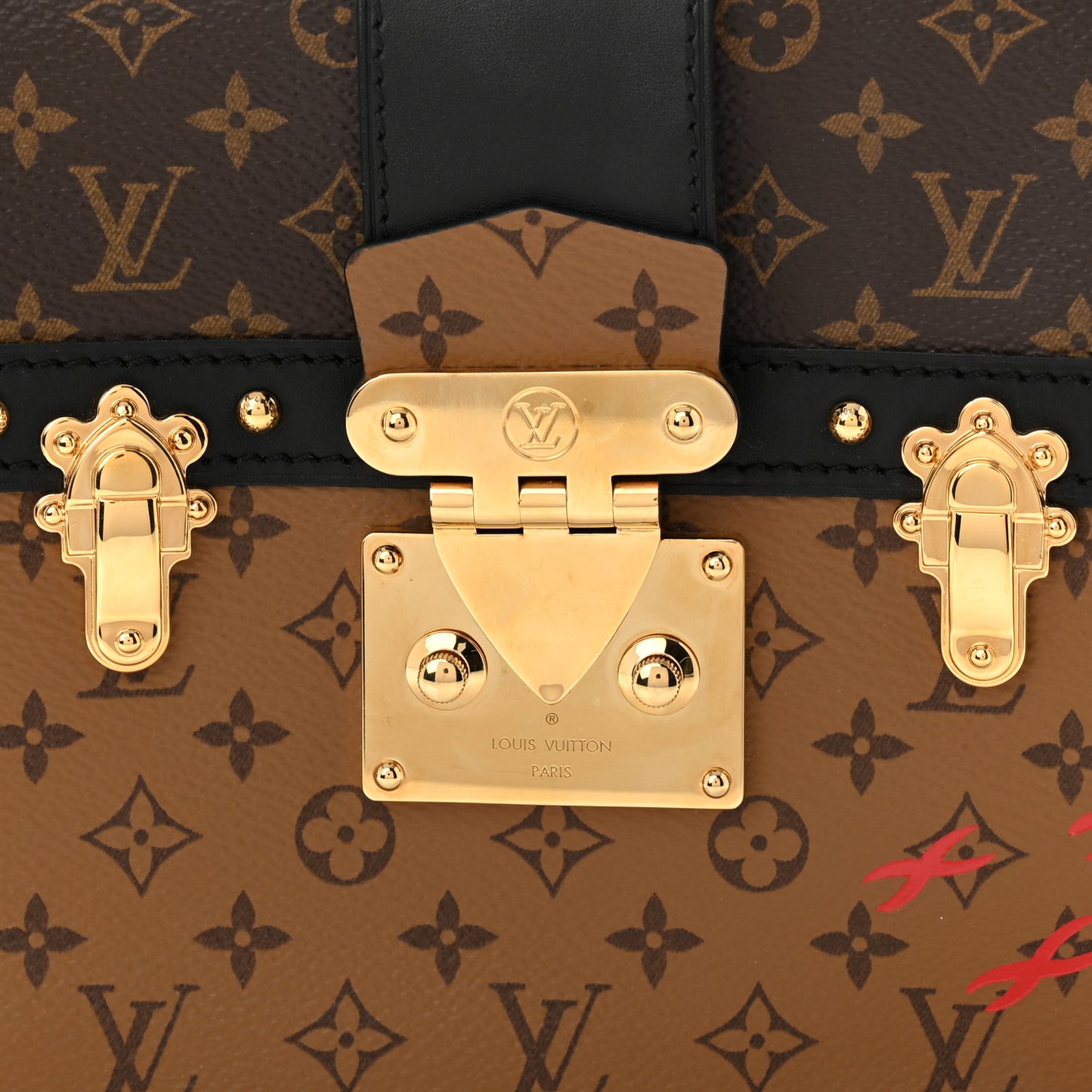 Reverse Monogram Trunk Clutch