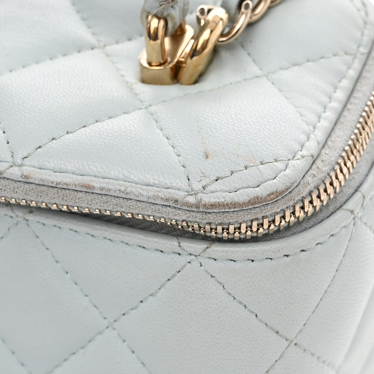 Lambskin Quilted Small Top Handle Vanity Case With Chain Light Blue