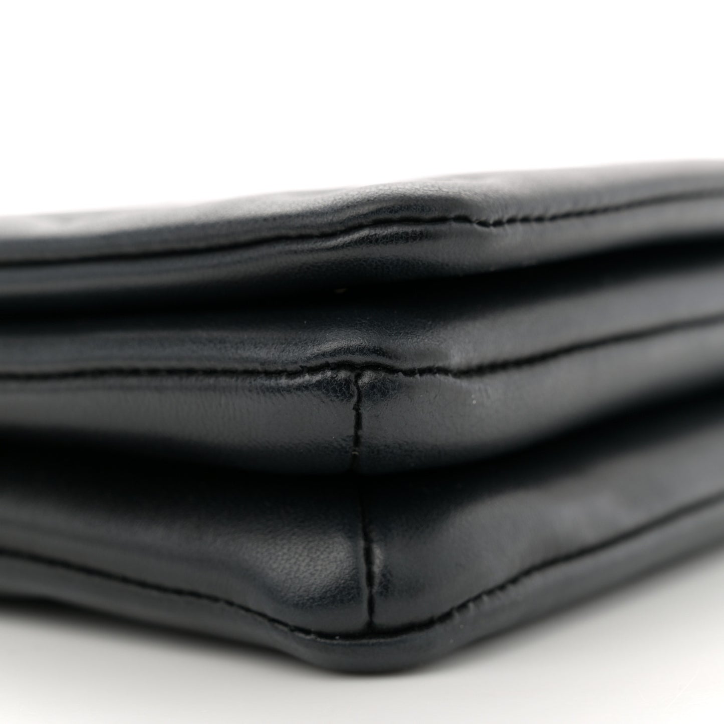 Lambskin Embossed Monogram Pochette Coussin Black
