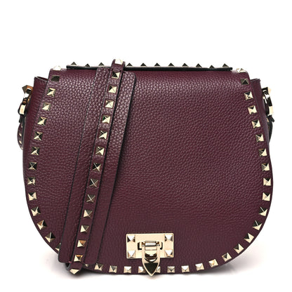 Valentino Garavani Pebbled Calfskin Rockstud Crossbody Saddle Bag Rubin 1 of 9