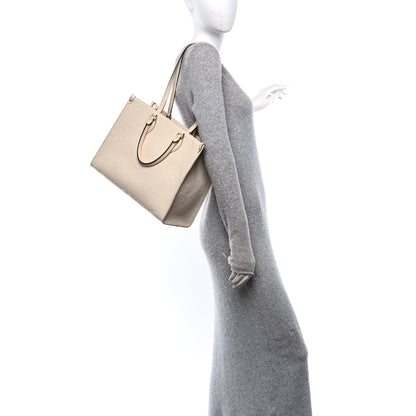 Louis Vuitton Empreinte Monogram Giant Onthego MM Creme 2 of 10