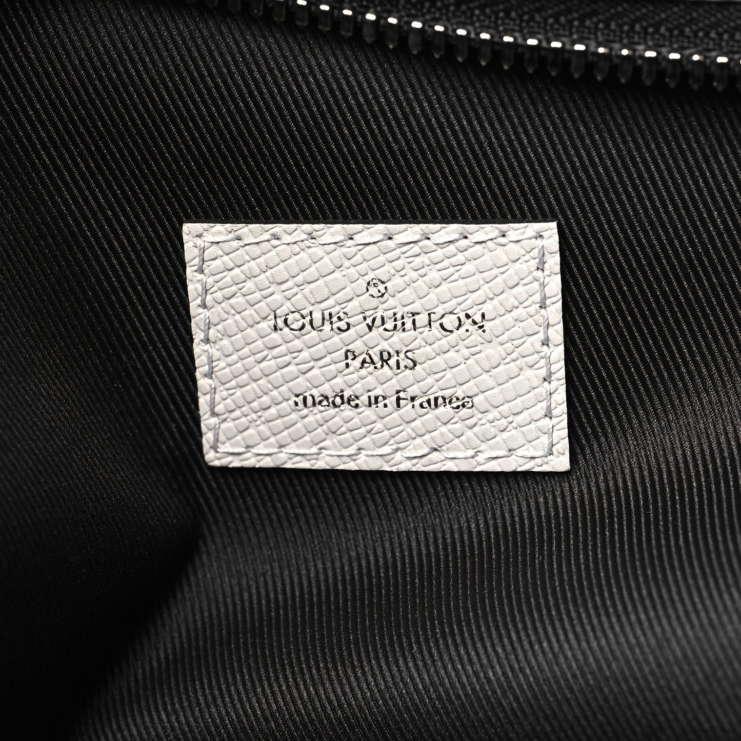 Taiga Monogram Discovery Backpack PM White