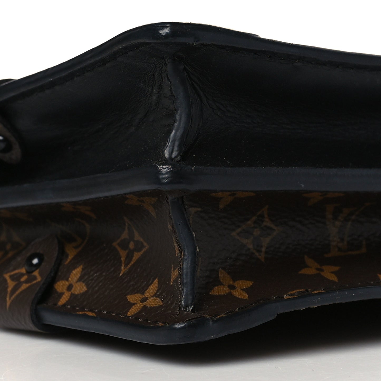Reverse Monogram Trunk Clutch