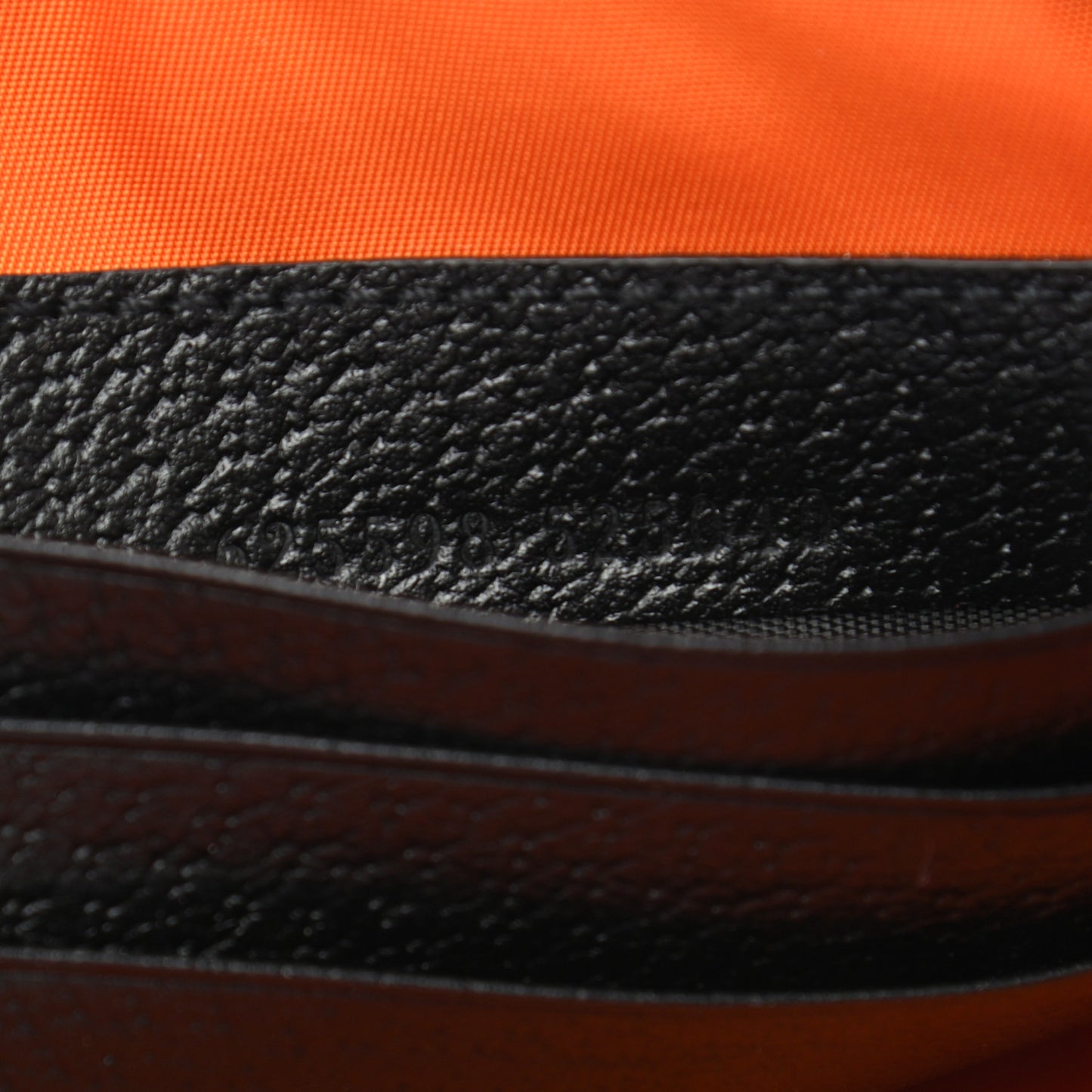 Econyl Nylon Monogram Off The Grid Zip Pouch Carrot Orange Black