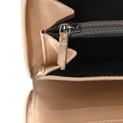 Chanel Lambskin Camellia Embossed Zip Around Organizer Wallet Light Beige 17 of 23