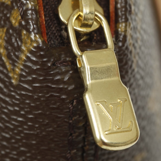 Monogram Mini Ellipse Wristlet Clutch