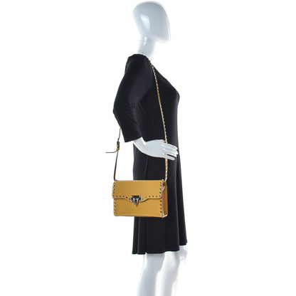 Valentino Garavani Pebbled Calfskin Medium Rockstud Flip Lock Crossbody Bag Yellow 3 of 15