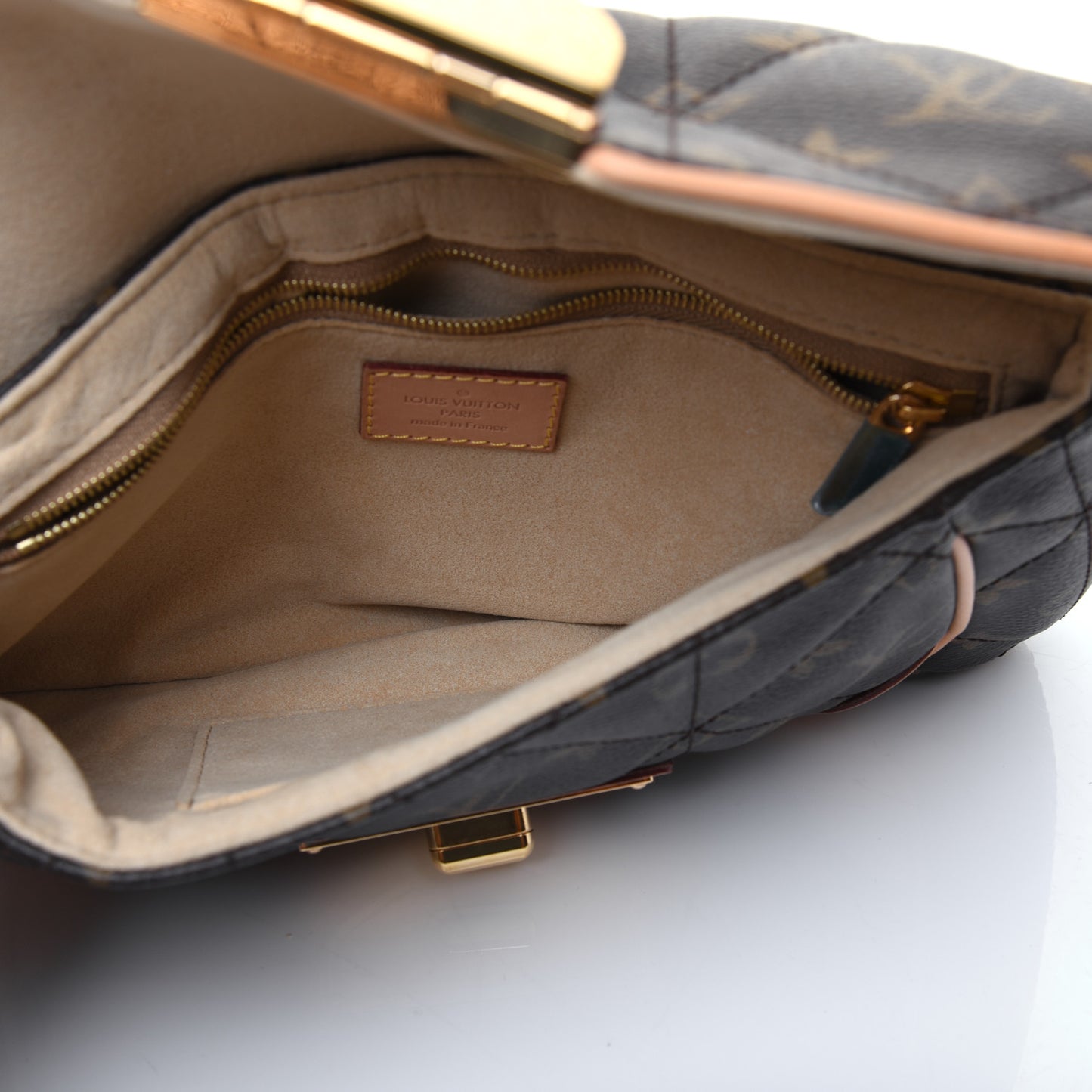 Monogram Etoile Clutch
