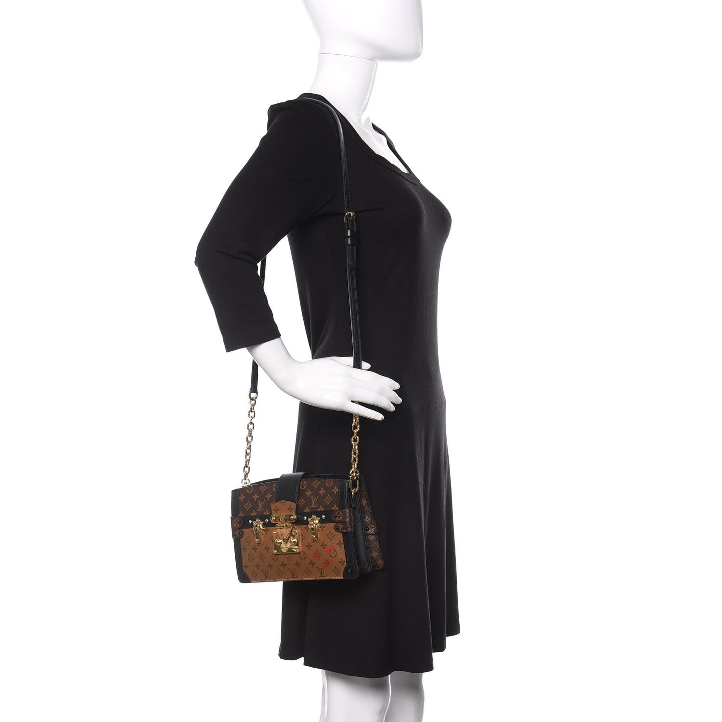 Reverse Monogram Trunk Clutch