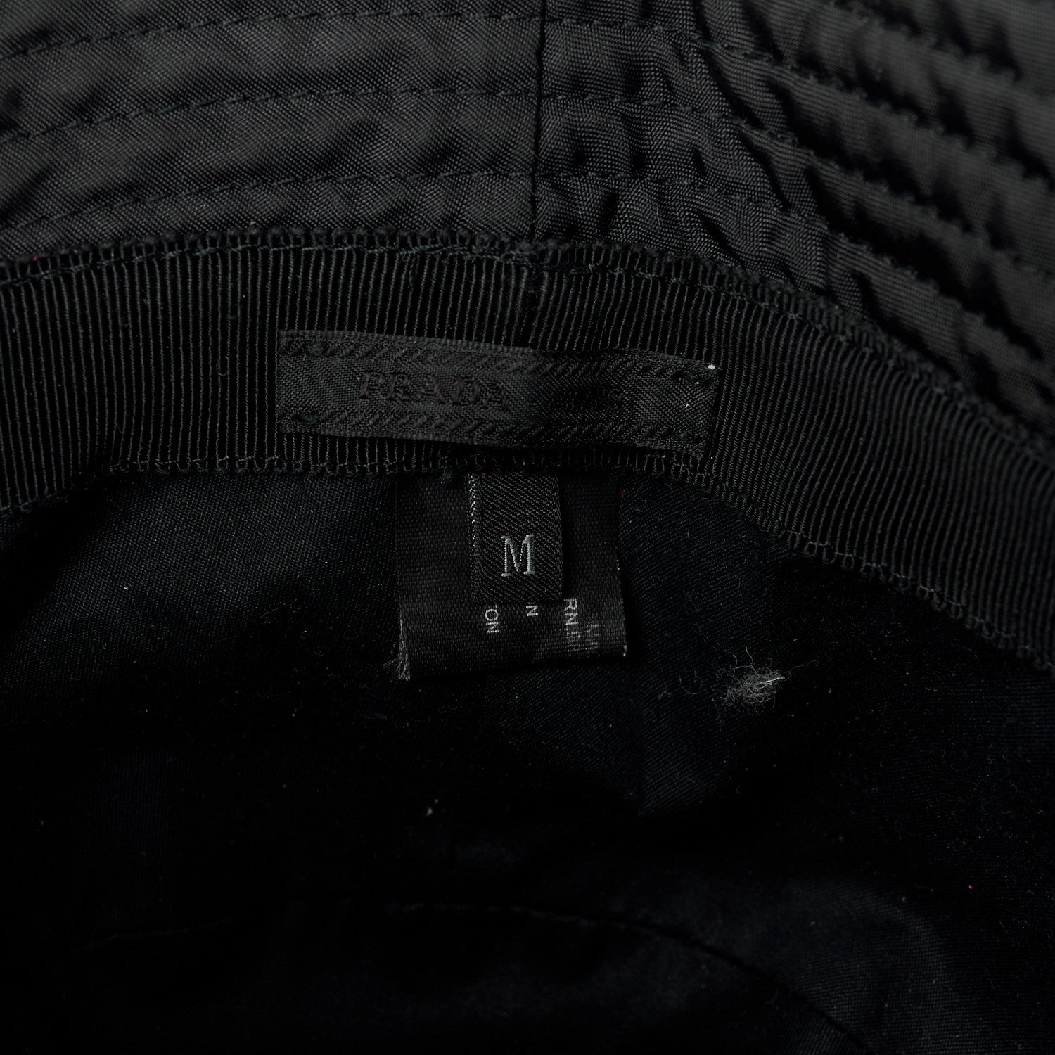 Prada Re-Nylon Metal Triangle Logo Womens Bucket Hat M Black 8 of 9