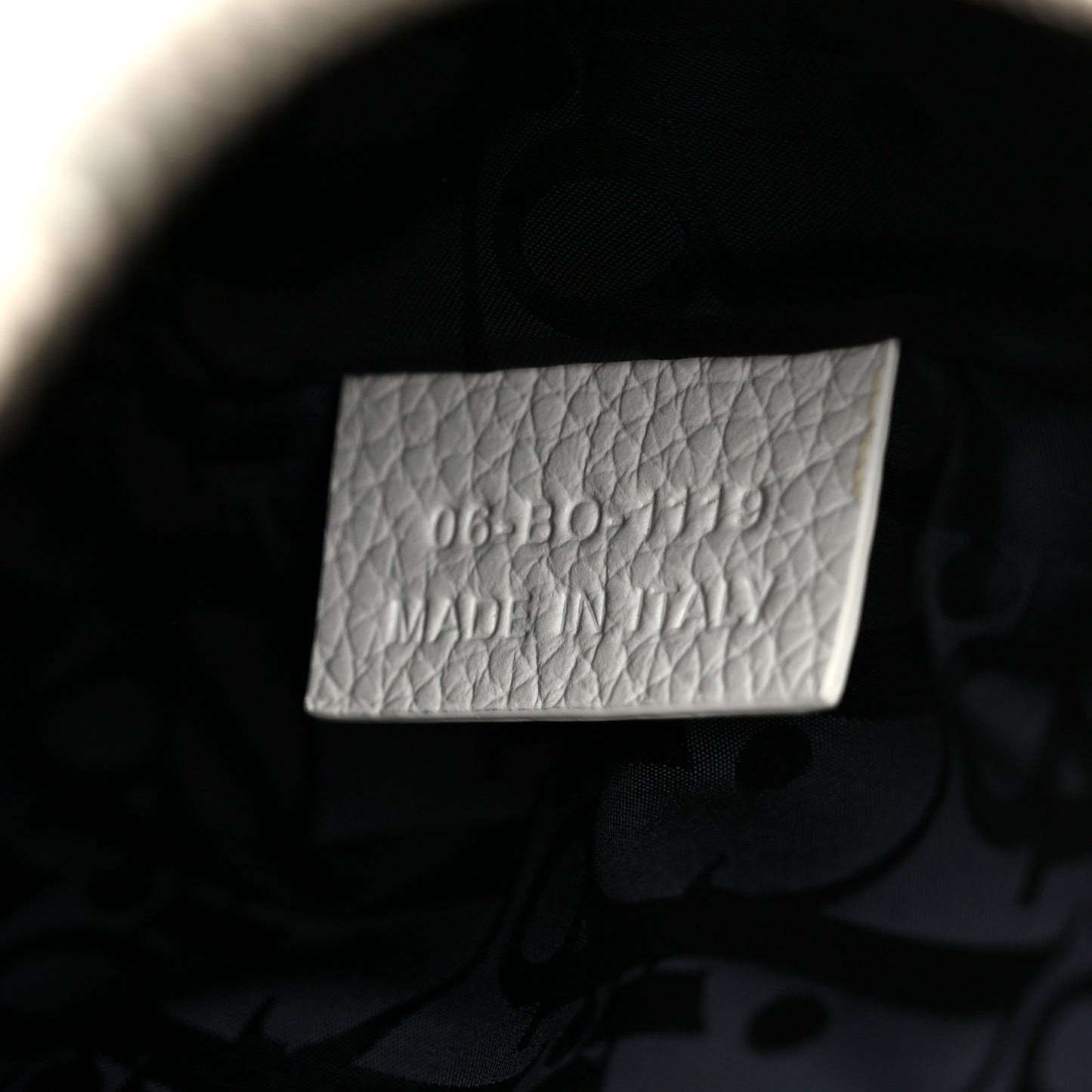 X DANIEL ARSHAM Grained Calfskin Newspaper Print Saddle Bag White