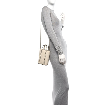 Valentino Garavani Pebbled Calfskin Rockstud North South Crossbody Bag Light Ivory 2 of 9