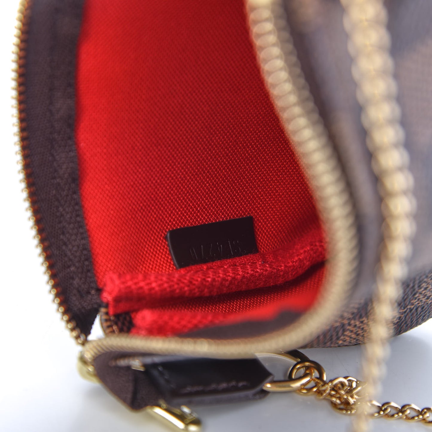 Damier Ebene Mini Pochette Accessories