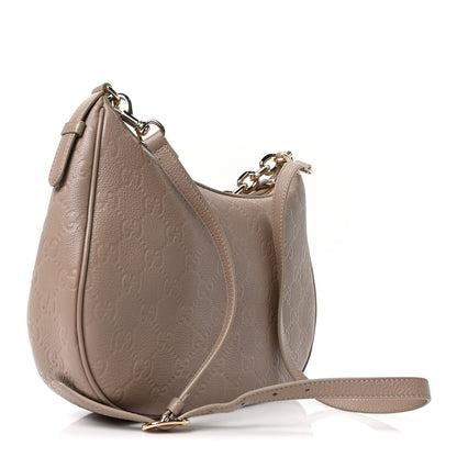 Gucci GG Grainy Calfskin Emblem Large Half Moon Shoulder Bag Taupe 3 of 10