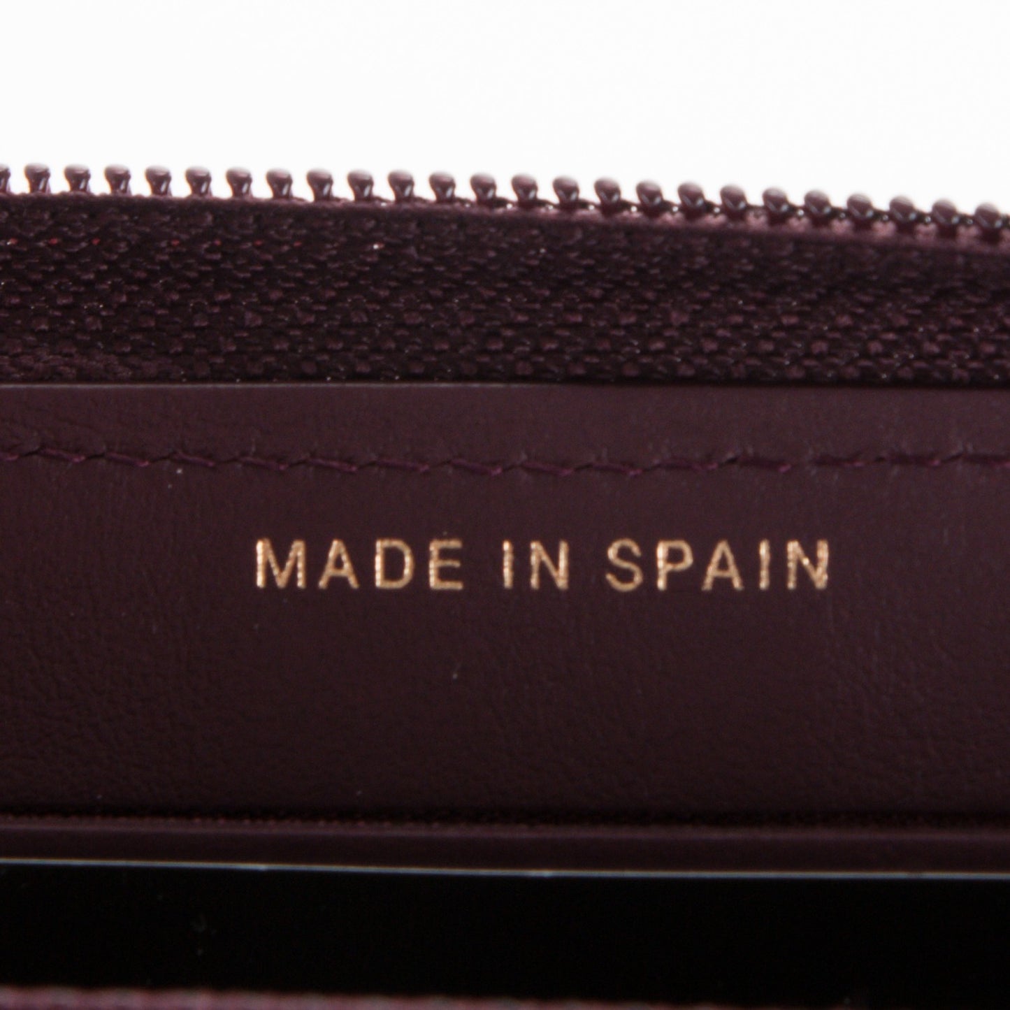 Caviar Quilted Small Boy Zip Around Wallet Dark Purple