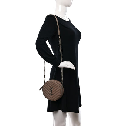 Saint Laurent Grain De Poudre Matelasse Chevron Quilted Round Vinyle Camera Bag Dark Beige 2 of 10