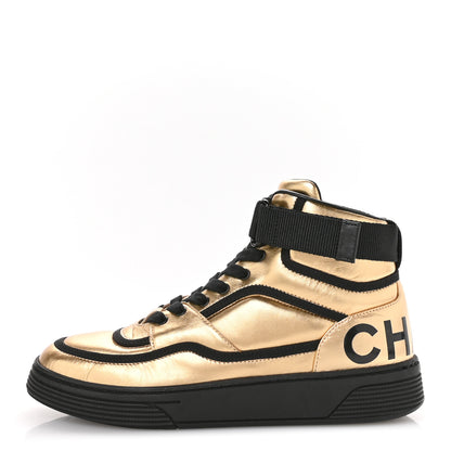 Chanel Metallic Satin Lambskin Logo High Top Sneakers 38 Gold Black 1 of 9