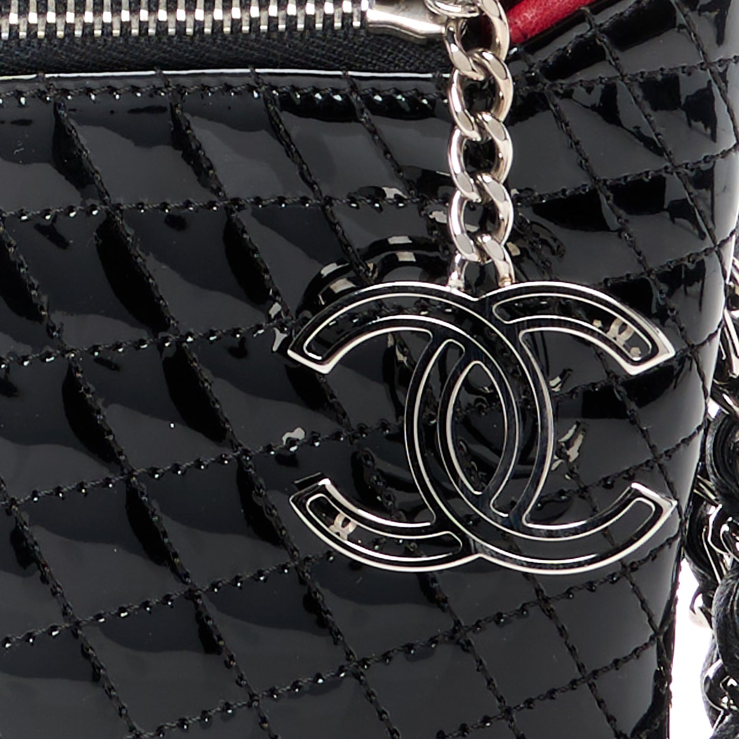 Patent Geometric Quilted Kaleidoscope Clutch Black