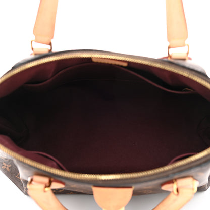 Louis Vuitton Monogram Rivoli MM 4 of 9