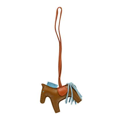 Hermes Milo Lambskin Grigri Rodeo Horse Bag Charm PM Kraft Celeste Pain D'Epice 1 of 3