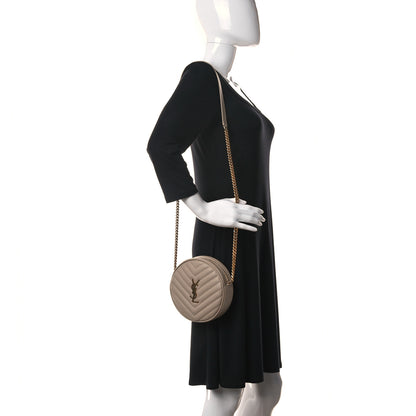 Saint Laurent Grain De Poudre Matelasse Chevron Quilted Round Vinyle Camera Bag Dark Beige 2 of 10