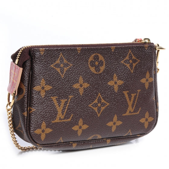 Monogram Trunks and Locks Mini Pochette Accessories