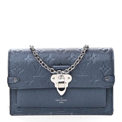 Louis Vuitton Metalli Empreinte Monogram Vavin Chain Wallet Navy Nacre 1 of 8