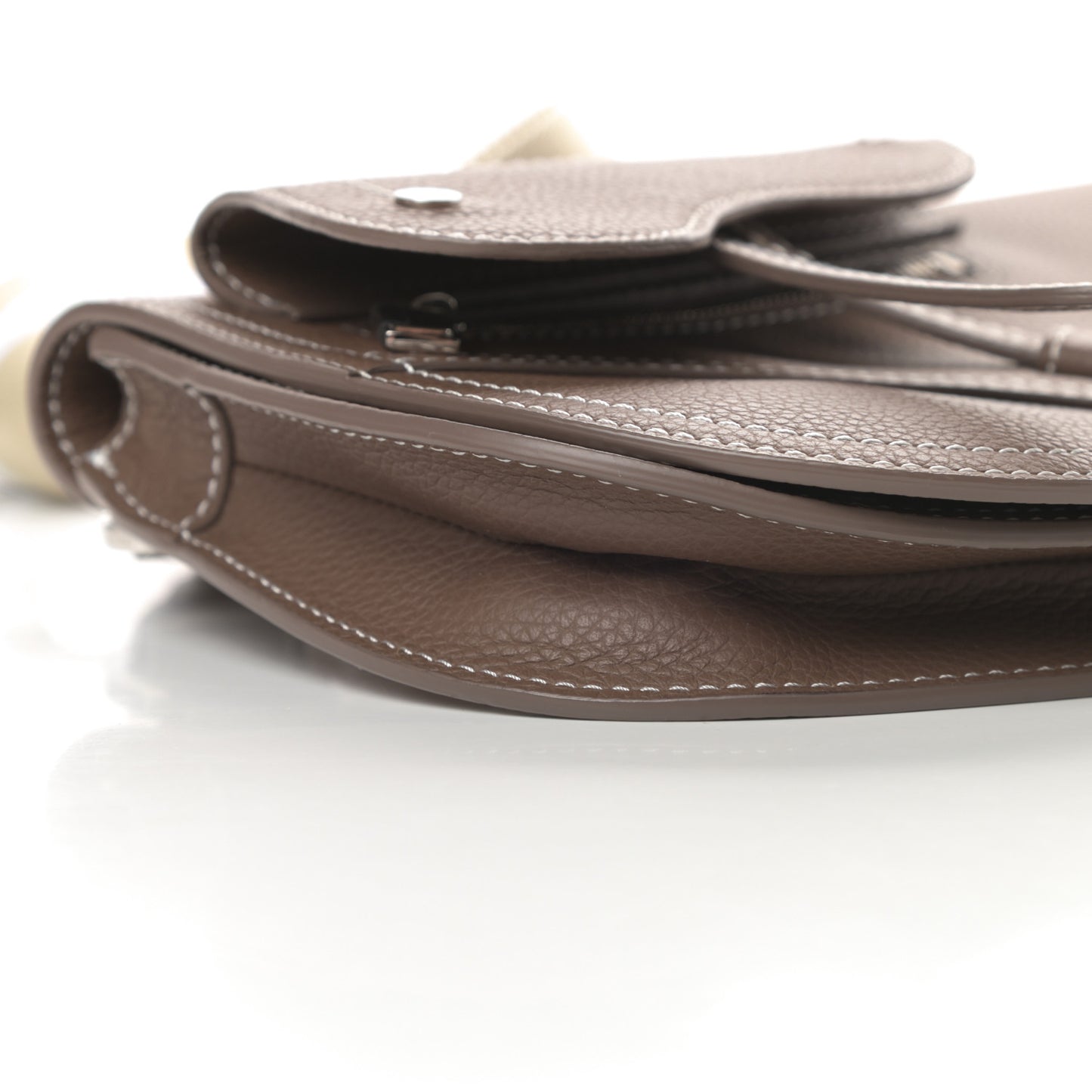 X KAWS Grained Calfskin Saddle Pouch Marron Multicolor