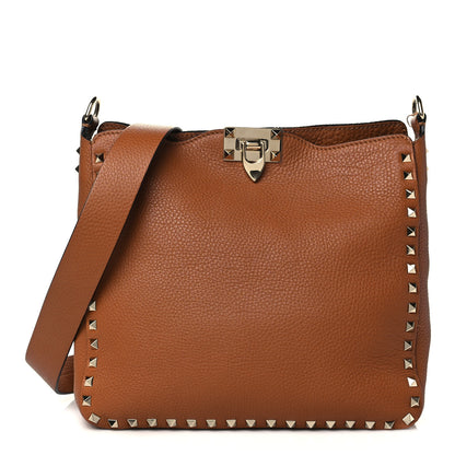 Valentino Garavani Pebbled Calfskin Small Rockstud Flip-Lock Messenger Bag Light Cuir 1 of 7