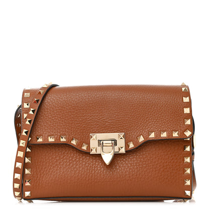 Valentino Garavani Pebbled Calfskin Medium Rockstud Flip Lock Crossbody Bag Saddle Brown 1 of 14