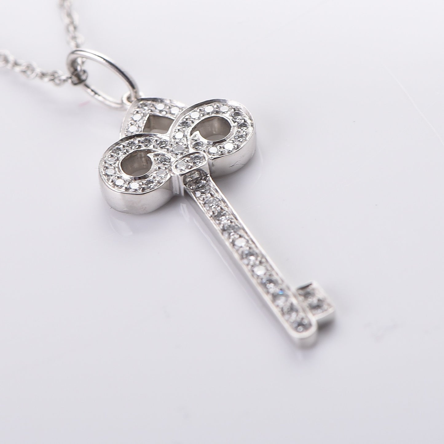 Platinum Diamond .12ct Fleur De Lis Key Pendant Necklace