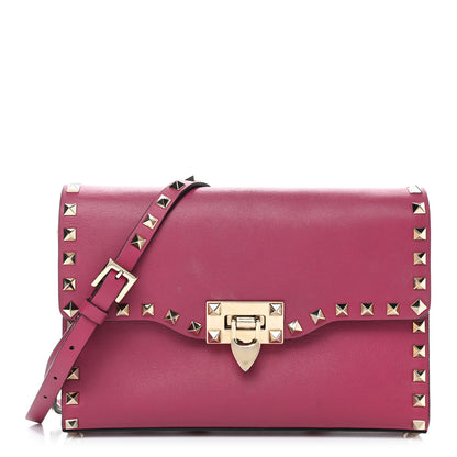 Valentino Garavani Vitello Medium Rockstud Flip Lock Crossbody Bag Deep Cyclamin 1 of 10