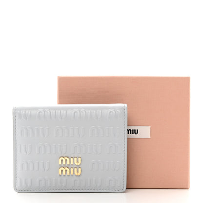 Miu Miu MIU MIU Calfskin Logo Embossed Bi-Fold Compact Wallet Fiordaliso 8 of 8
