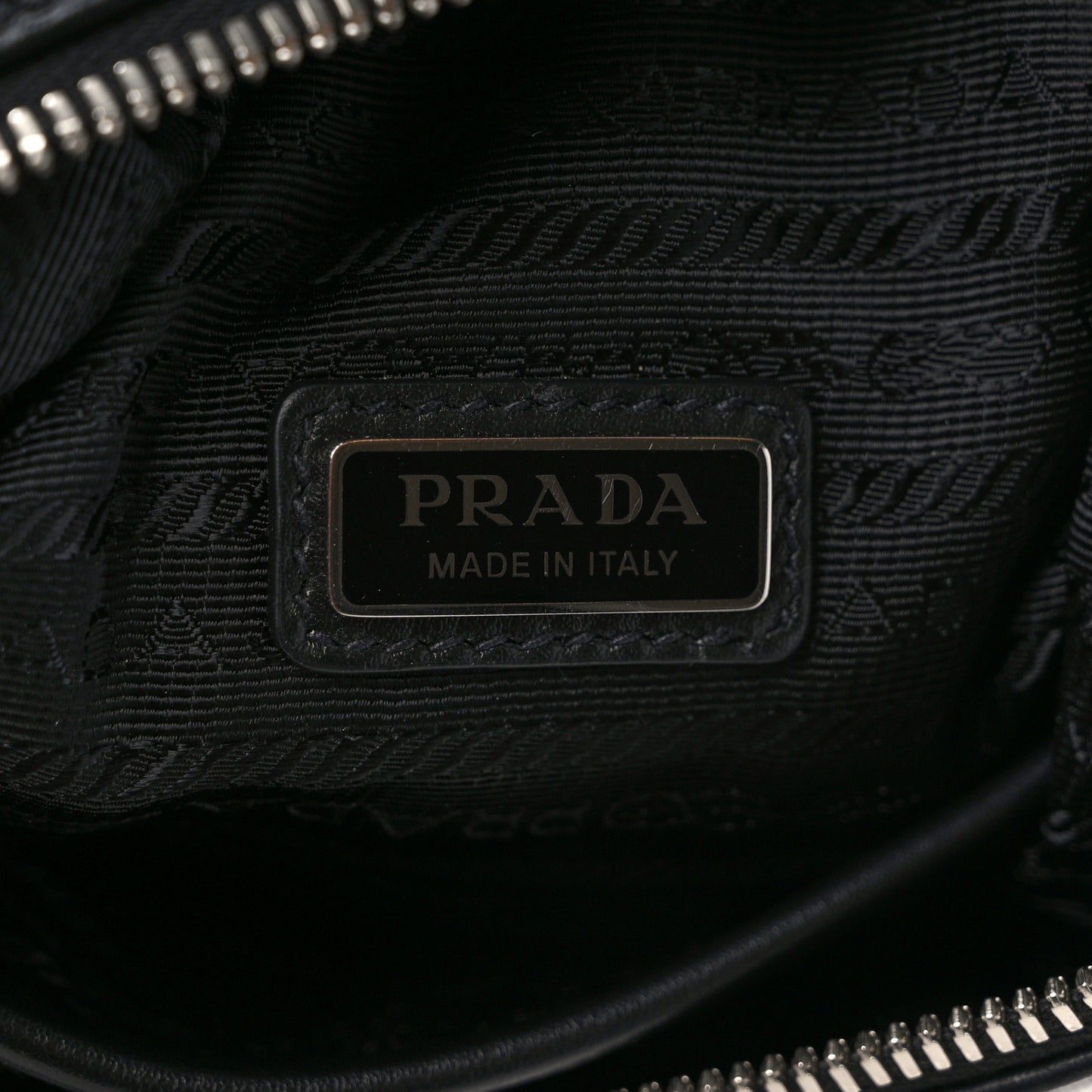 Vitello Daino Logo Embossed Cross Sling Backpack Black