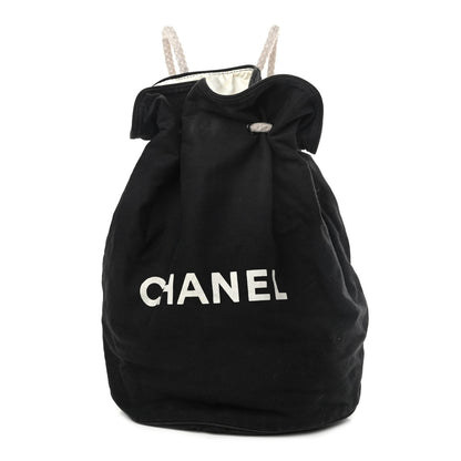 Chanel Canvas Drawstring Backpack Black White 1 of 12