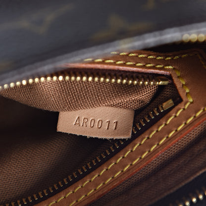 Louis Vuitton Monogram Trotteur 7 of 11