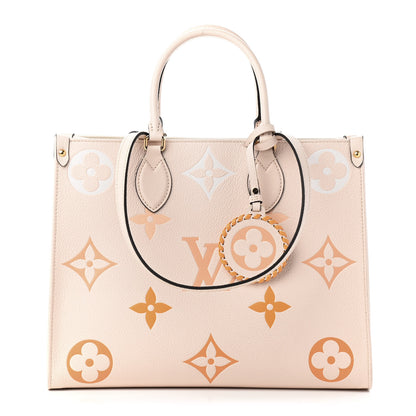 Louis Vuitton Empreinte Monogram Giant By The Pool Onthego MM Cream Saffron 1 of 5