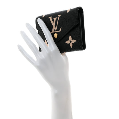 Louis Vuitton Empreinte Monogram Giant Victorine Wallet Black Beige 2 of 7